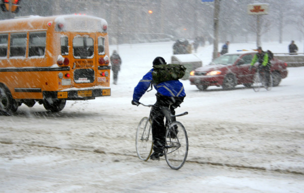 Bicycle messengers in a snowstorm