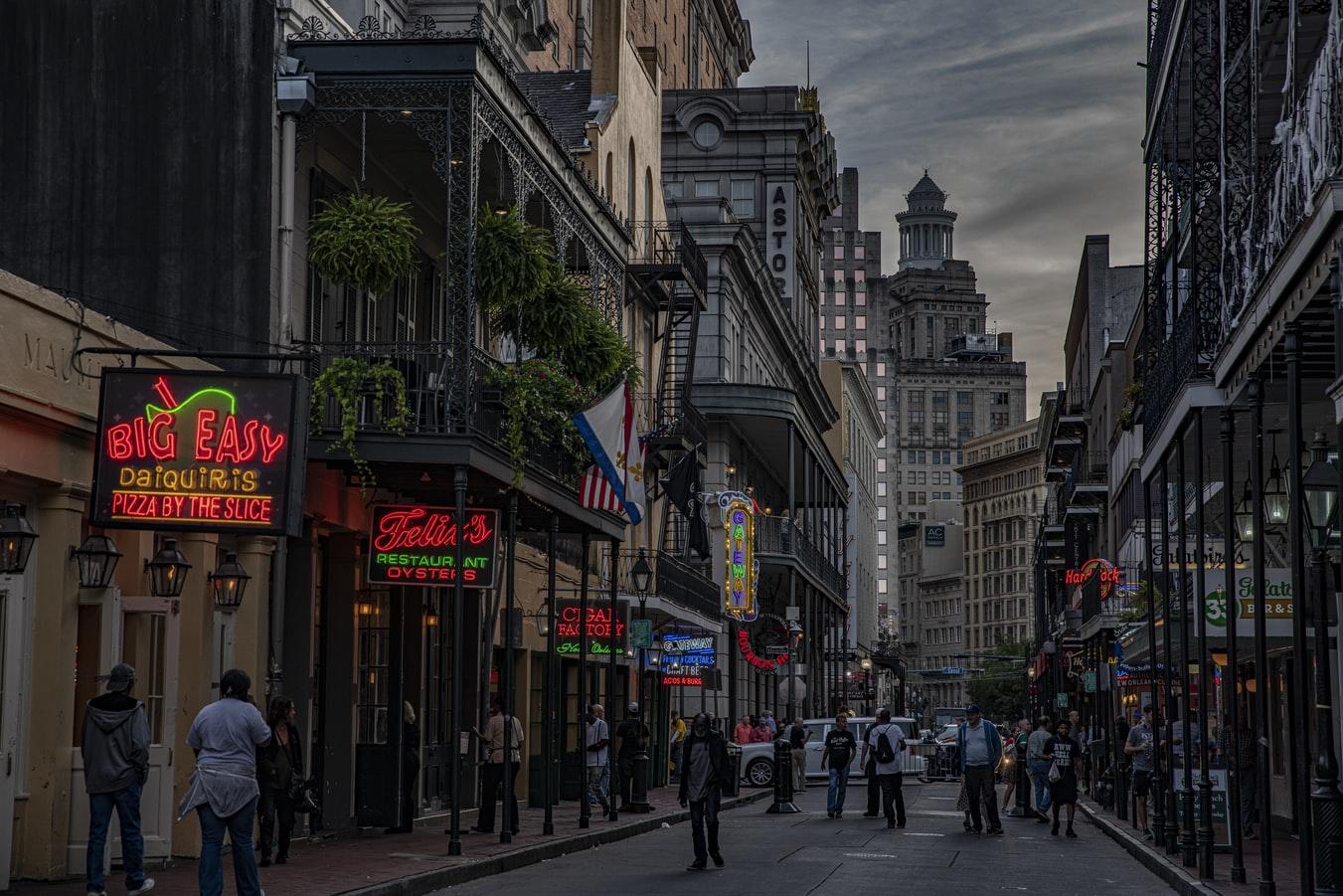 A view of a busy street in New Orleans at night.